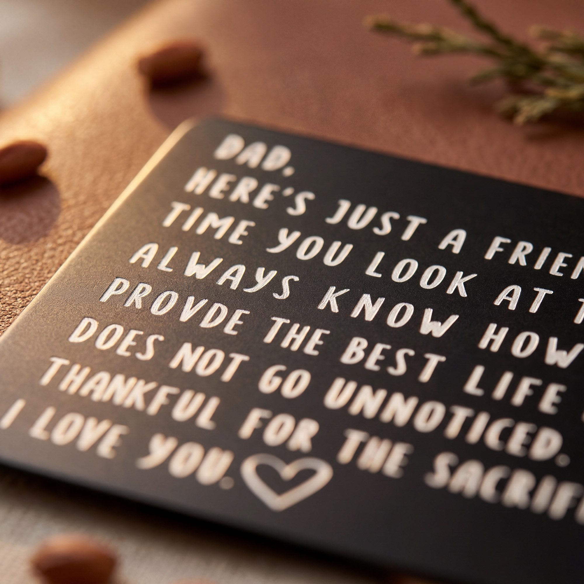 Close-up of laser-engraved memorial wallet card